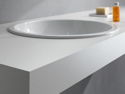 Waschtischaufsatz mit eingelassenem Waschbecken Weißer Waschtischaufsatz mit eingelassenem runden Waschbecken